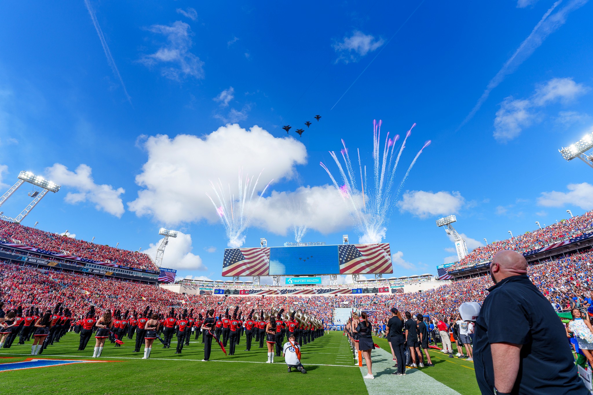 Pregame at EverBank Stadium: a four-ship flyover and fireworks over the bands and the flag on the video board.