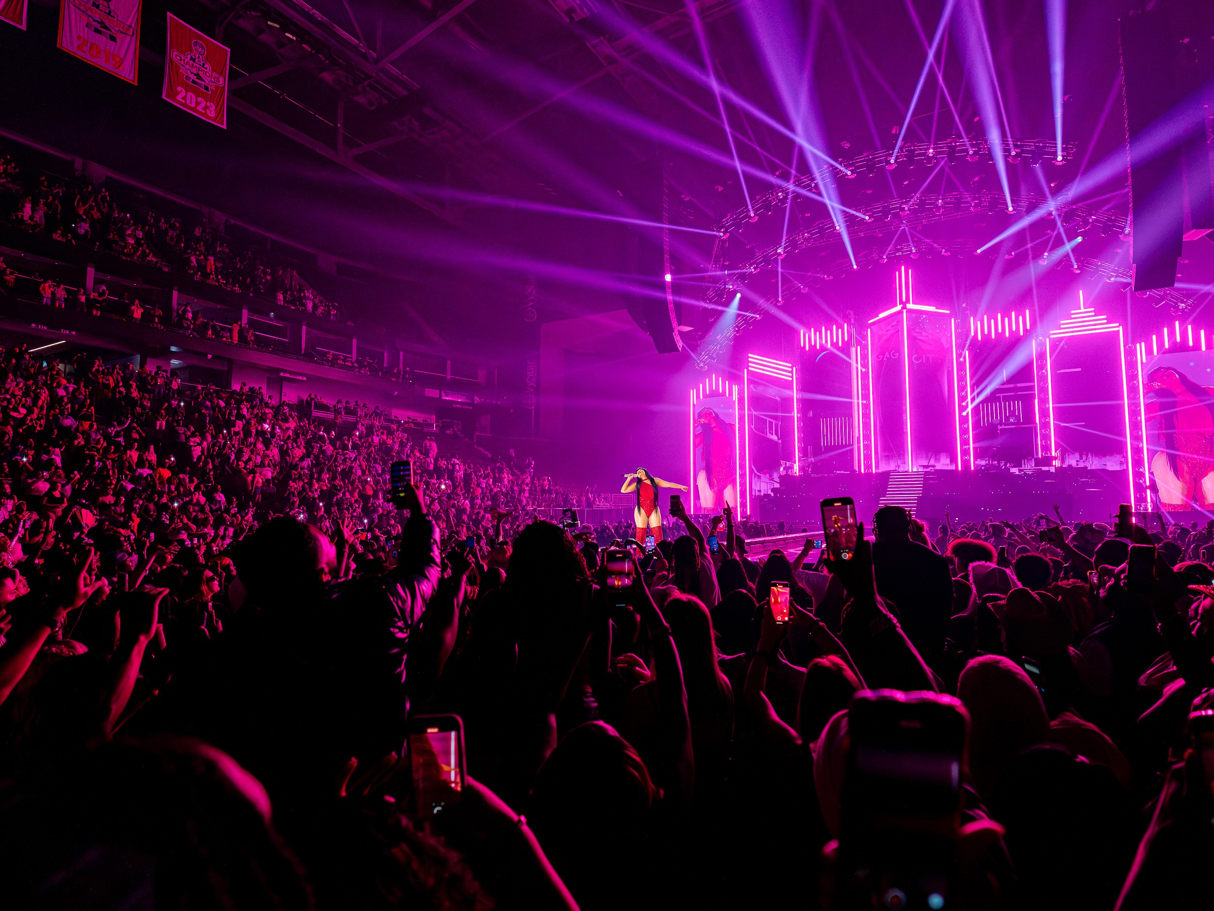 The arena washed pink from the floor: Nicki Minaj on stage, phones up across the bowl, banners in the rafters.