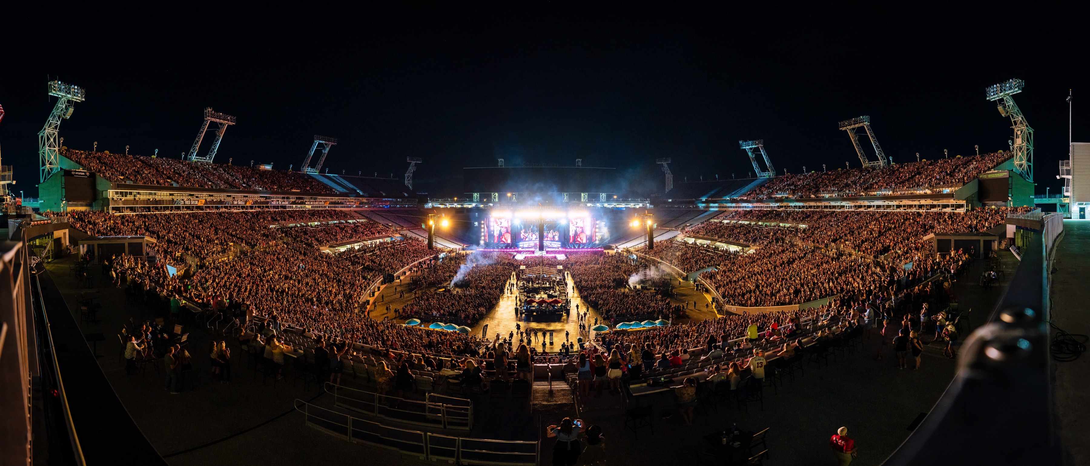 The full bowl of EverBank Stadium from the upper deck, the stage lit at the far end.